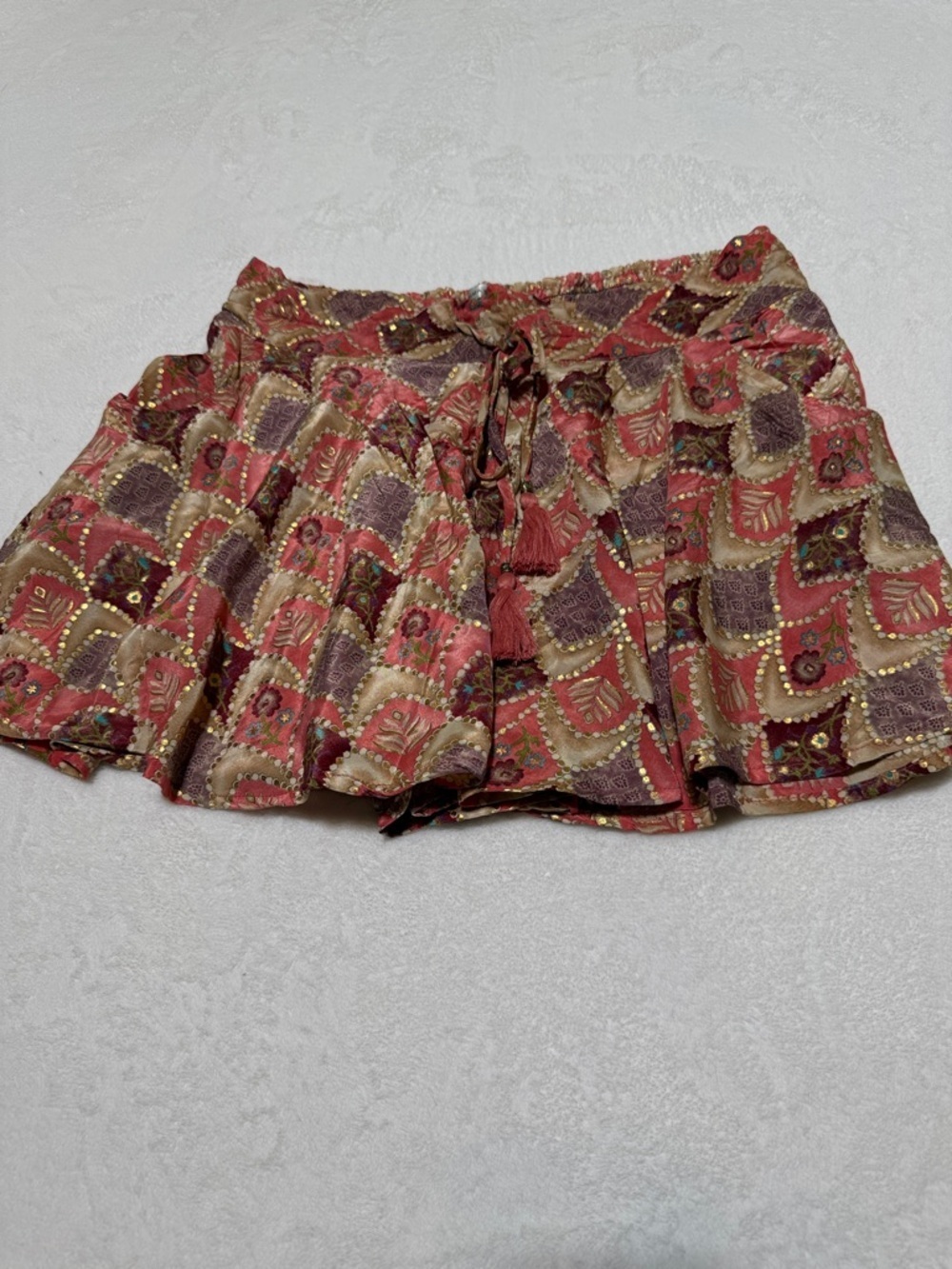 Karma Highway Boho Tassel Mini Shorts in Rust and Mauve